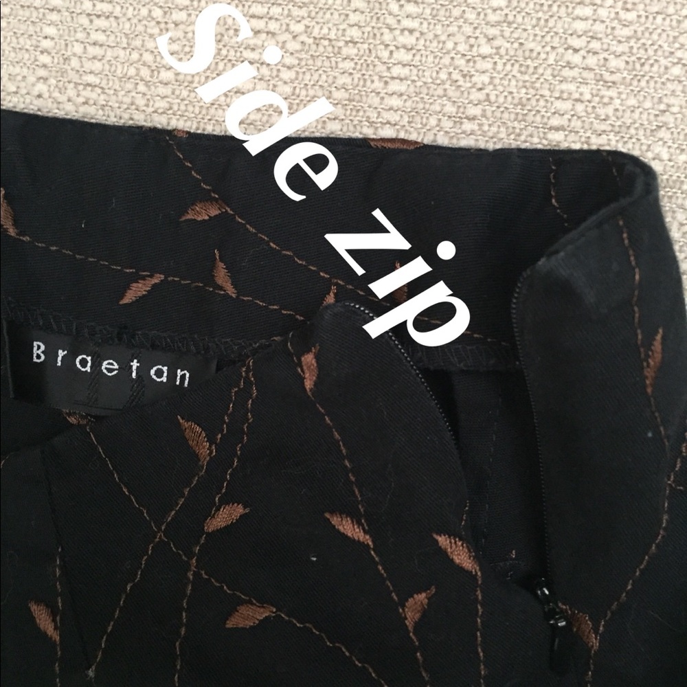 Black dress pants with copper sewn print